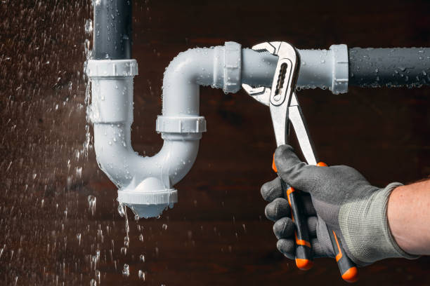 Professional Drain Cleaning technician working in Pella, IA